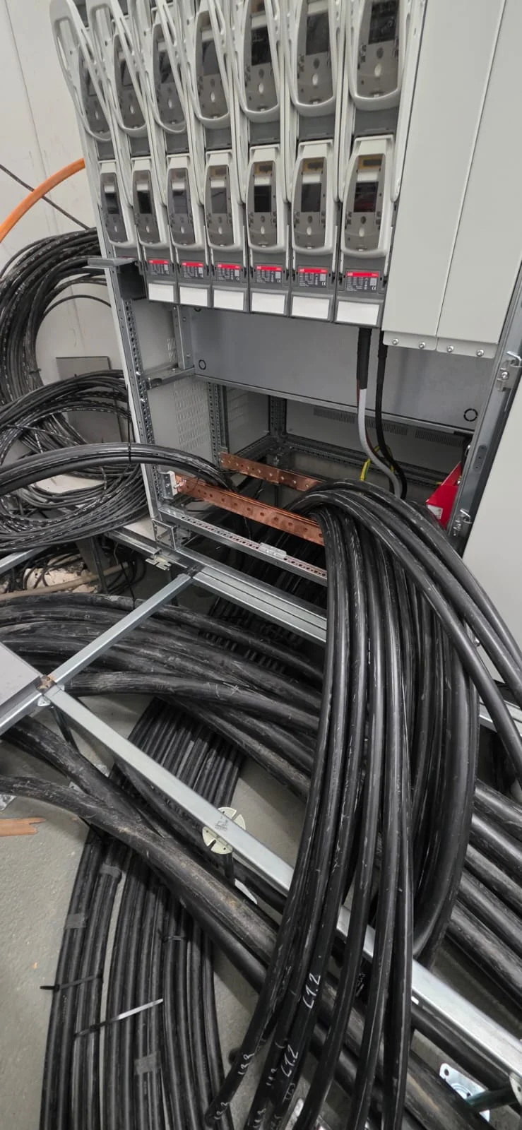 Pulling heavy supply cables from spools during NSHV switchboard installation